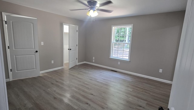 1323 Higginbotham Rd, Mcminnville, TN 37110 - unfurnished bedroom with wood finished floors and a ceiling fan