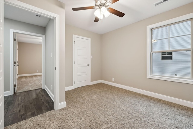 130 Alabama Ave, Oak Grove, KY 42262 - unfurnished bedroom featuring dark carpet and ceiling fan