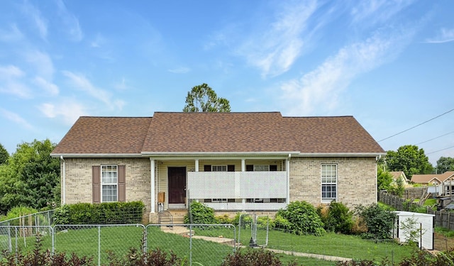 3728 Priest St, Clarksville, TN 37040 - view of front of home featuring a porch, brick siding, a fenced front yard, and a shingled roof