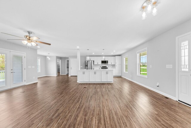 369 Springwater Dr, Summertown, TN 38483 - unfurnished living room with plenty of natural light, wood finished floors, recessed lighting, and ceiling fan