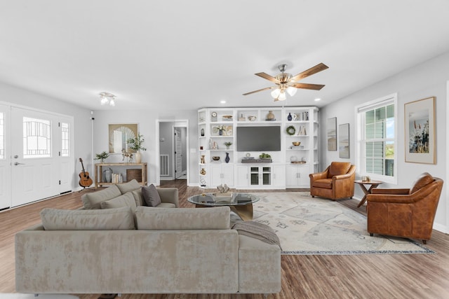 369 Springwater Dr, Summertown, TN 38483 - living area with plenty of natural light, ceiling fan, wood finished floors, and recessed lighting