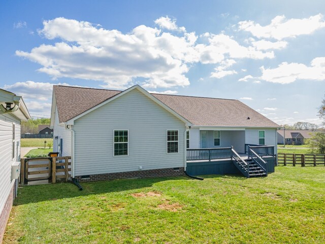 369 Springwater Dr, Summertown, TN 38483 - rear view of house with roof with shingles, a fenced backyard, crawl space, and a wooden deck