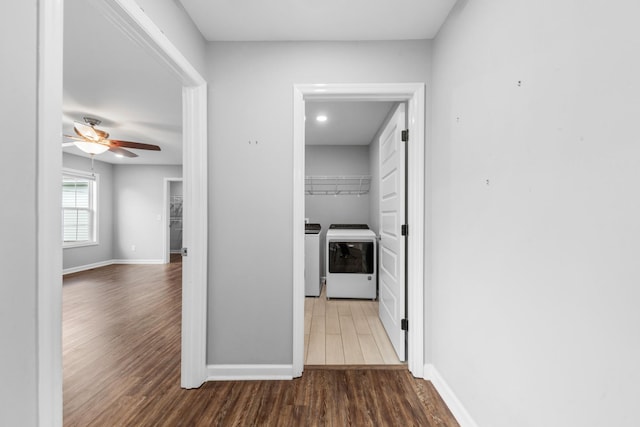 369 Springwater Dr, Summertown, TN 38483 - hall with washer and dryer and wood finished floors