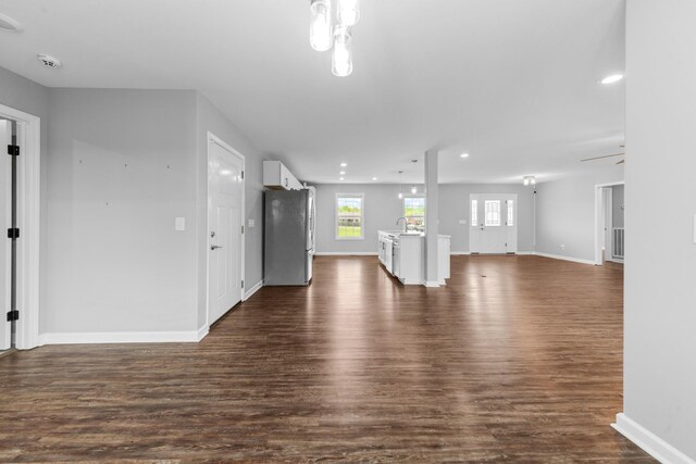 369 Springwater Dr, Summertown, TN 38483 - unfurnished living room featuring dark wood-style flooring, recessed lighting, and a ceiling fan