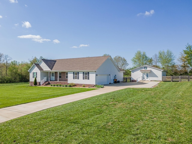 369 Springwater Dr, Summertown, TN 38483 - ranch-style house with driveway, brick siding, an attached garage, and a shingled roof