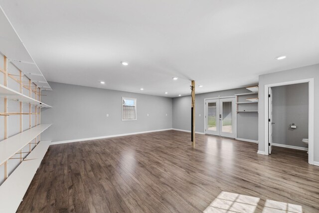 369 Springwater Dr, Summertown, TN 38483 - unfurnished living room featuring wood finished floors, recessed lighting, and french doors