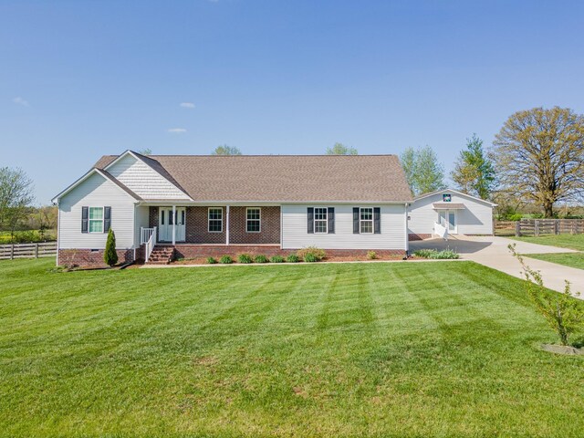 369 Springwater Dr, Summertown, TN 38483 - single story home featuring crawl space, covered porch, roof with shingles, and driveway