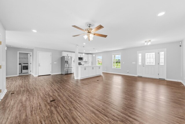 369 Springwater Dr, Summertown, TN 38483 - unfurnished living room with recessed lighting, ceiling fan, dark wood-style flooring, and washing machine and clothes dryer