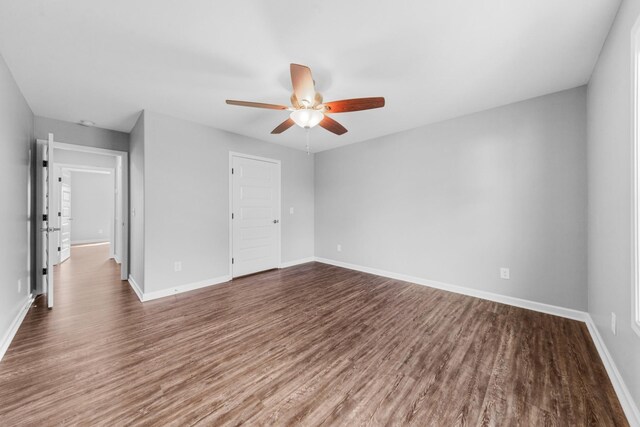 369 Springwater Dr, Summertown, TN 38483 - empty room featuring ceiling fan and dark wood-type flooring