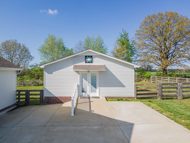 369 Springwater Dr, Summertown, TN 38483 - back of property featuring a patio area and a shingled roof