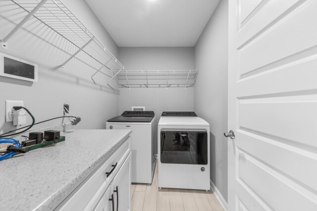 369 Springwater Dr, Summertown, TN 38483 - laundry room with independent washer and dryer and baseboards