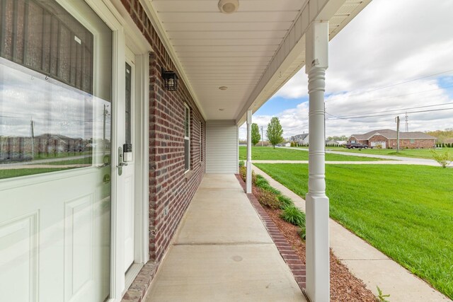 369 Springwater Dr, Summertown, TN 38483 - porch with a yard and a residential view