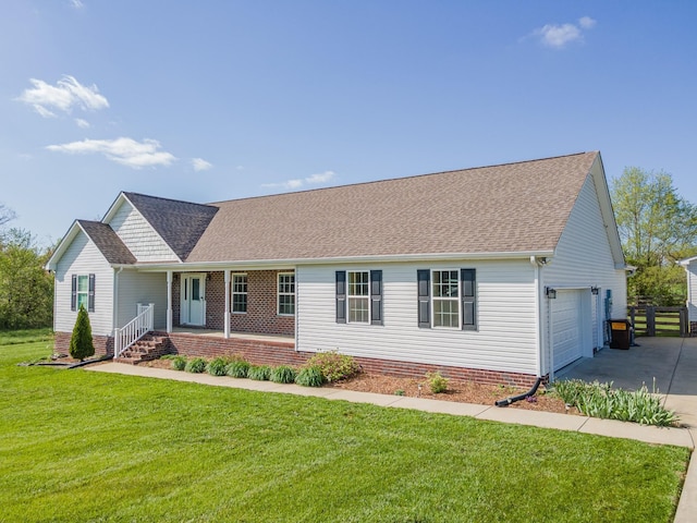 369 Springwater Dr, Summertown, TN 38483 - ranch-style home with covered porch, a garage, roof with shingles, and driveway