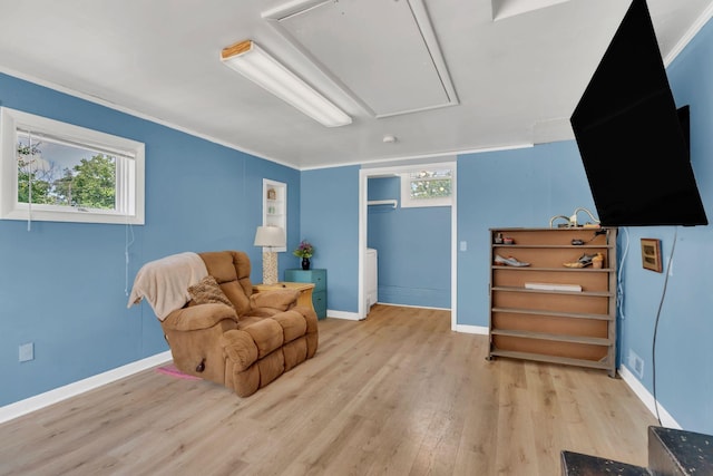 1827 Shelley St, Murfreesboro, TN 37129 - sitting room featuring attic access, wood finished floors, healthy amount of natural light, and crown molding