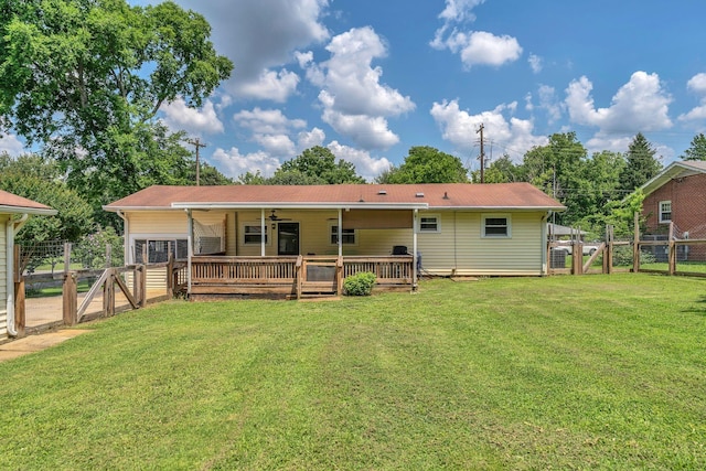 1827 Shelley St, Murfreesboro, TN 37129 - back of property featuring a fenced backyard, a gate, a wooden deck, and a ceiling fan