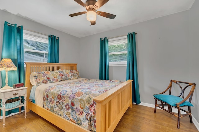 1827 Shelley St, Murfreesboro, TN 37129 - bedroom featuring multiple windows, wood finished floors, and ceiling fan