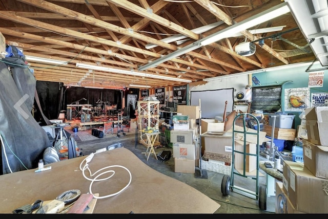 1827 Shelley St, Murfreesboro, TN 37129 - garage with a garage door opener and a workshop area