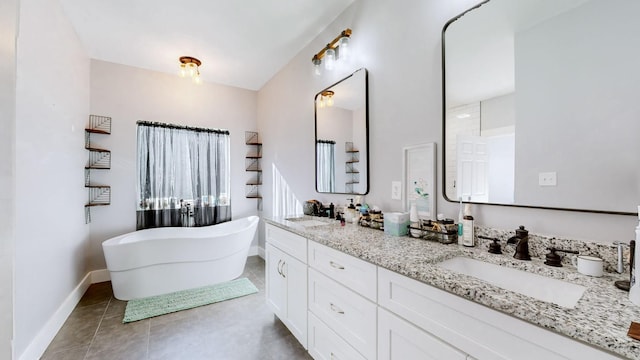 3310 Rocky Branch Rd, Watertown, TN 37184 - full bath featuring double vanity, a freestanding bath, and tile patterned floors