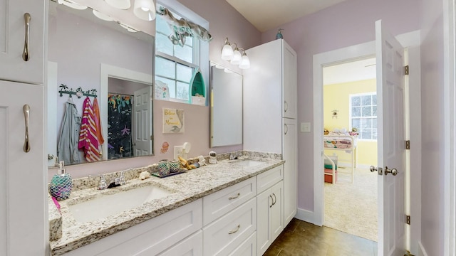 3310 Rocky Branch Rd, Watertown, TN 37184 - bathroom with double vanity, healthy amount of natural light, tile patterned floors, and a spacious closet