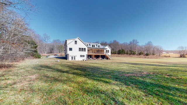 3310 Rocky Branch Rd, Watertown, TN 37184 - rear view of house featuring a lawn and a deck