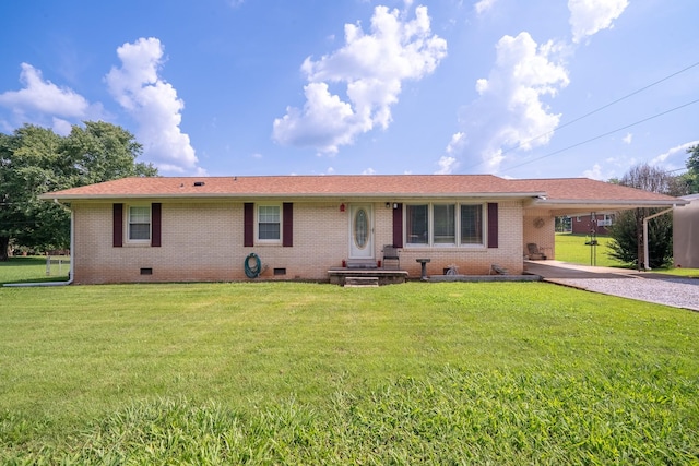 502 Budd St, Saint Joseph, TN 38481 - ranch-style house featuring brick siding, crawl space, an attached carport, driveway, and a front yard