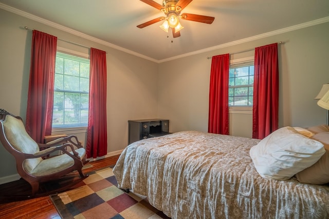 502 Budd St, Saint Joseph, TN 38481 - bedroom with wood finished floors, ornamental molding, and a ceiling fan