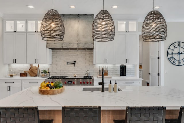 7025 Lanceleaf Dr, College Grove, TN 37046 - kitchen featuring a chandelier, backsplash, and an island with sink