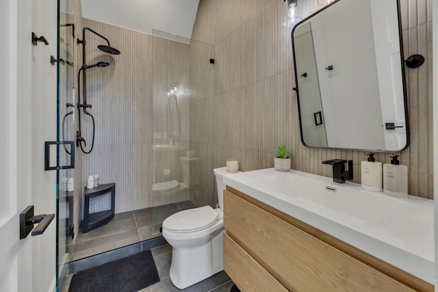7025 Lanceleaf Dr, College Grove, TN 37046 - bathroom with tile walls, walk in shower, tile patterned flooring, and vanity