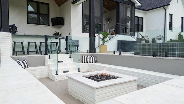 7025 Lanceleaf Dr, College Grove, TN 37046 - view of patio / terrace with an outdoor fire pit and stairs