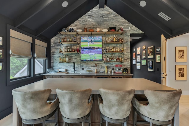 7025 Lanceleaf Dr, College Grove, TN 37046 - indoor wet bar featuring light wood finished floors