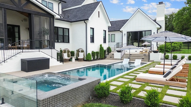 7025 Lanceleaf Dr, College Grove, TN 37046 - view of swimming pool with a patio and a pool with connected hot tub