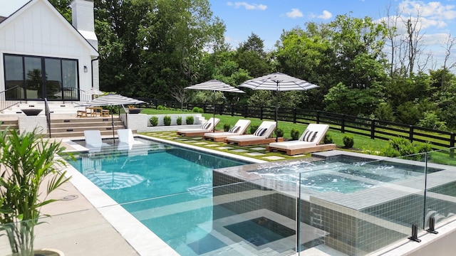7025 Lanceleaf Dr, College Grove, TN 37046 - view of swimming pool featuring an in-ground hot tub and a patio