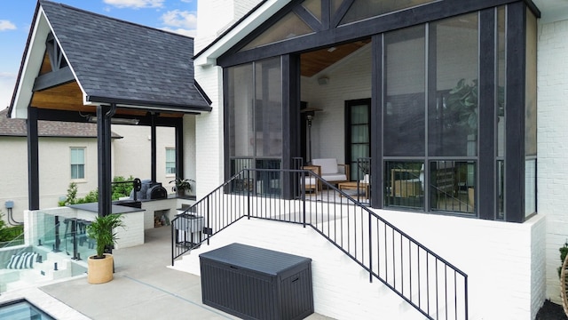 7025 Lanceleaf Dr, College Grove, TN 37046 - view of patio featuring a sunroom