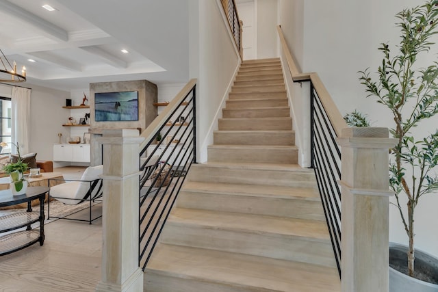 7025 Lanceleaf Dr, College Grove, TN 37046 - staircase featuring coffered ceiling, beamed ceiling, recessed lighting, and wood finished floors