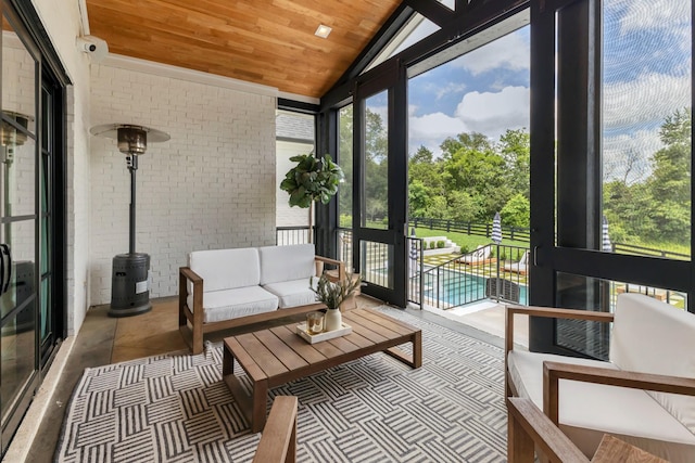 7025 Lanceleaf Dr, College Grove, TN 37046 - sunroom / solarium with an outdoor hangout area, brick wall, wooden ceiling, lofted ceiling, and floor to ceiling windows