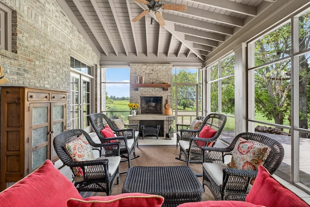 123 Jones Rd, Taft, TN 38488 - sunroom featuring ceiling fan and an outdoor living space with a fireplace