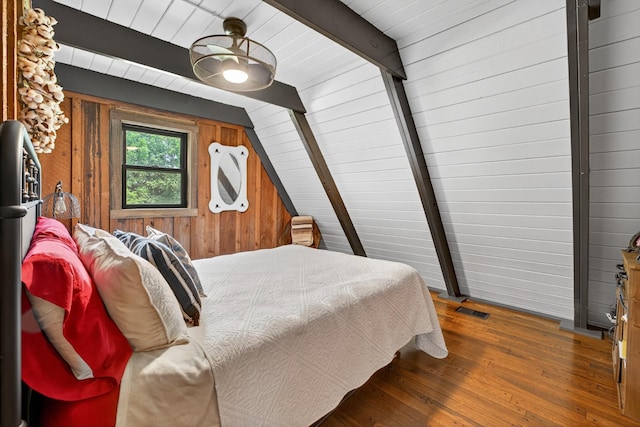 123 Jones Rd, Taft, TN 38488 - bedroom featuring hardwood / wood-style flooring, wooden walls, and wood ceiling