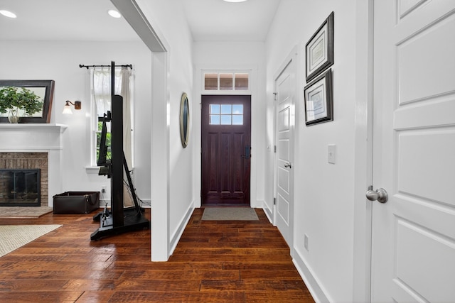 123 Jones Rd, Taft, TN 38488 - foyer with dark wood-style flooring, recessed lighting, and a fireplace