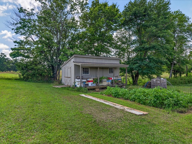 123 Jones Rd, Taft, TN 38488 - view of grassy yard with an outbuilding