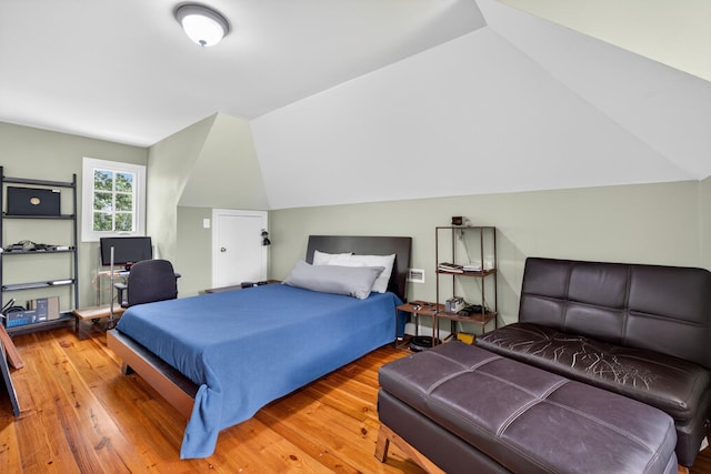 123 Jones Rd, Taft, TN 38488 - bedroom featuring hardwood / wood-style flooring and lofted ceiling