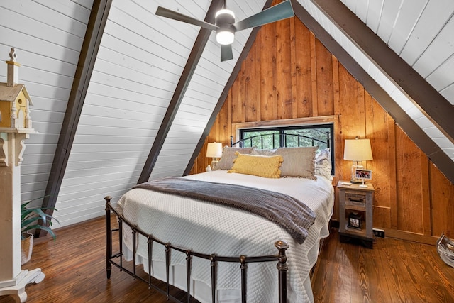 123 Jones Rd, Taft, TN 38488 - bedroom featuring vaulted ceiling, wooden walls, and wood-type flooring