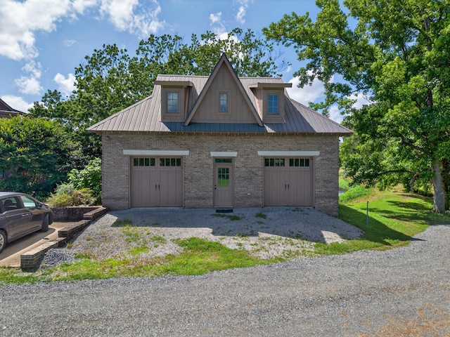 123 Jones Rd, Taft, TN 38488 - view of front of house with brick siding and a metal roof
