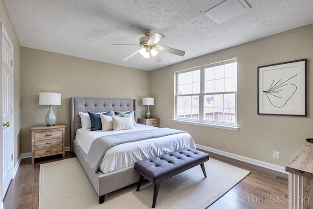 5766 Amalie Dr, Nashville, TN 37211 - bedroom featuring dark wood-type flooring, a ceiling fan, and a textured ceiling