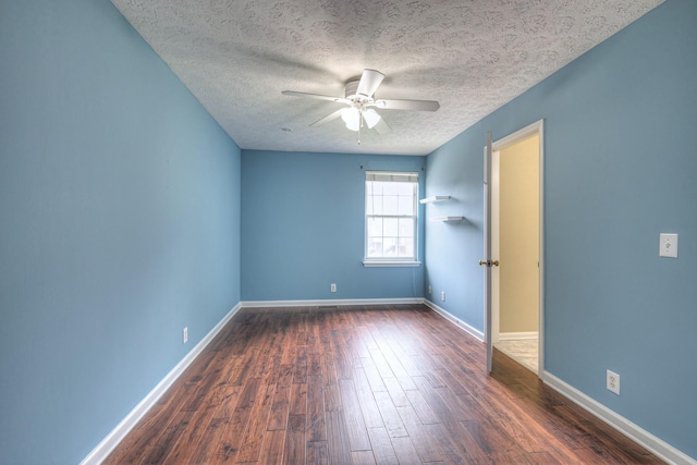 5766 Amalie Dr, Nashville, TN 37211 - spare room with ceiling fan, dark wood-type flooring, and a textured ceiling
