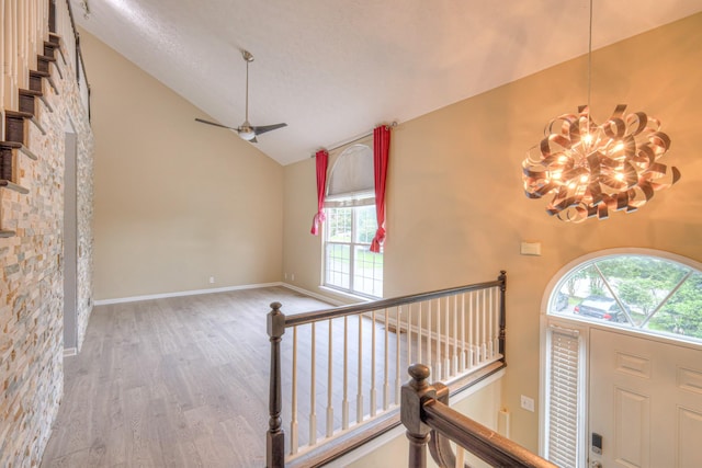 5766 Amalie Dr, Nashville, TN 37211 - entryway featuring high vaulted ceiling, a chandelier, wood finished floors, a ceiling fan, and a textured ceiling