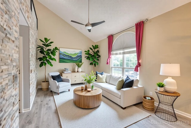 5766 Amalie Dr, Nashville, TN 37211 - living room featuring vaulted ceiling, wood finished floors, and a ceiling fan