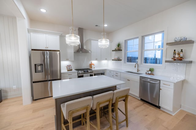 4076 Penfield Dr Unit A, Franklin, TN 37069 - kitchen featuring stainless steel appliances, open shelves, wall chimney exhaust hood, light wood-type flooring, and white cabinetry
