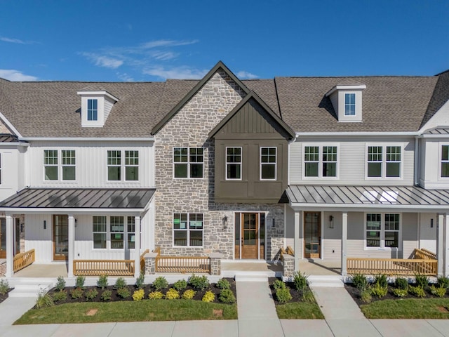 4076 Penfield Dr Unit A, Franklin, TN 37069 - view of front of home with covered porch, board and batten siding, a standing seam roof, and roof with shingles