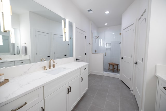 4068 Penfield Dr Unit C, Franklin, TN 37069 - full bath with vanity, a shower stall, tile patterned flooring, and recessed lighting