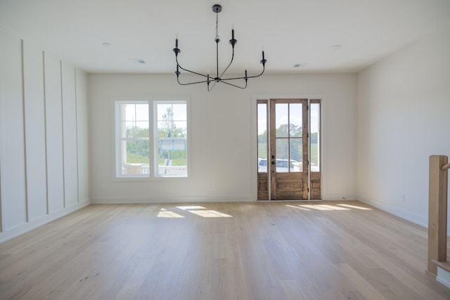 4068 Penfield Dr Unit C, Franklin, TN 37069 - unfurnished dining area featuring a chandelier, plenty of natural light, and light wood-type flooring